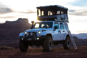 JK Wrangler with roof rack tent using AEV high capacity coil springs