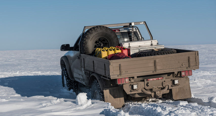 AEV Prospector XL Tray Bed loaded with a equipment on its way to the Arctic circle.