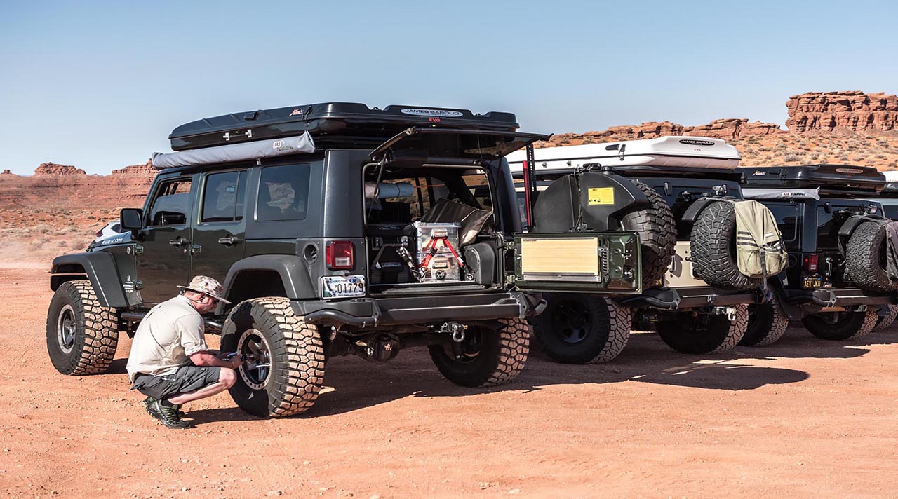 AEV Jeep at a stop with tail gate open